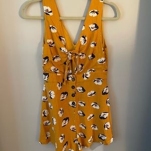 Mustard yellow Romper with tie key hole and detailed buttons